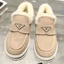 Зимние мокасины Prada с меховой отделкой
