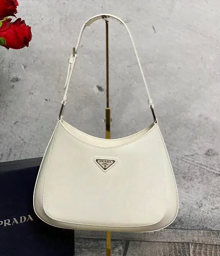 Женская сумка Prada Cleo кожаная белая-0