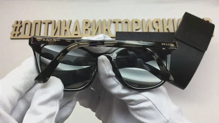 Очки солнцезащитные 03X 1AB-5Z1 Prada с футляром